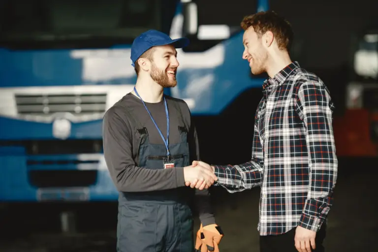 Fuel Doctor UK technician and driver shaking hands after an AdBlue contamination recovery